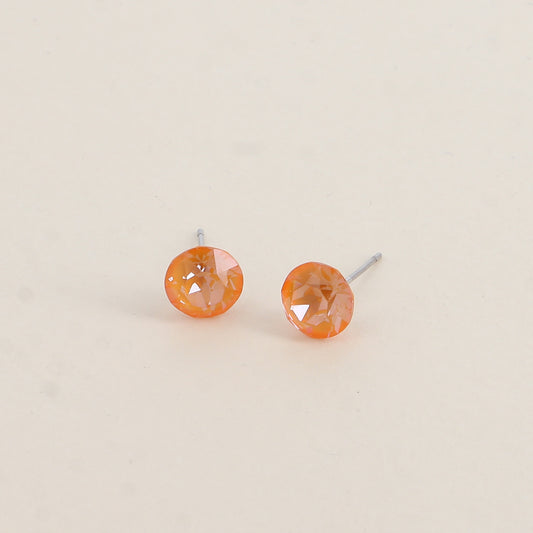 Boucles puces argentées – Ornées de cristaux de Swarovski® SS39 - Dimensions de la boucle : 8x8 mm - Mango ignite
