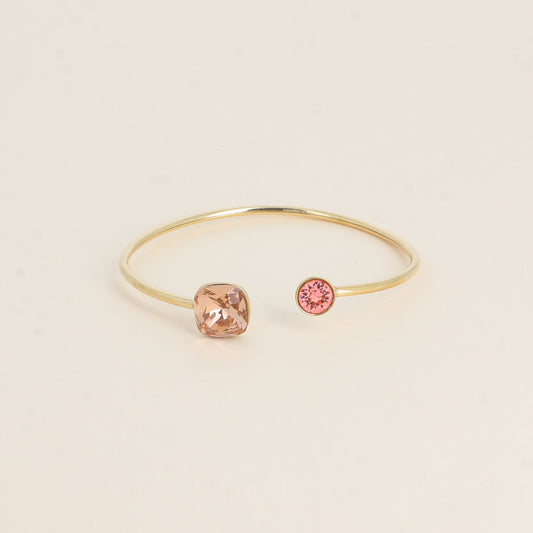Jonc orné de cristaux de Swarovski® 10 mm et SS29 - Hauteur du jonc: 11 mm - Dimension du cristal 1: 10x10 mm - Diamètre du cristal 2: 7 mm - Vintage rose and rose peach