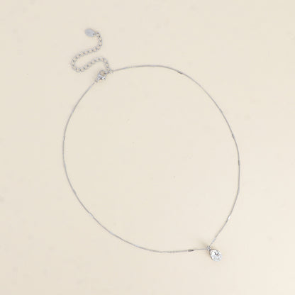 Collier en rhodium orné de cristaux de Swarovski® en forme de goutte - Longueur de chaîne : 38+7 cm - Dimensions du cristal : 7x10 mm - Crystal