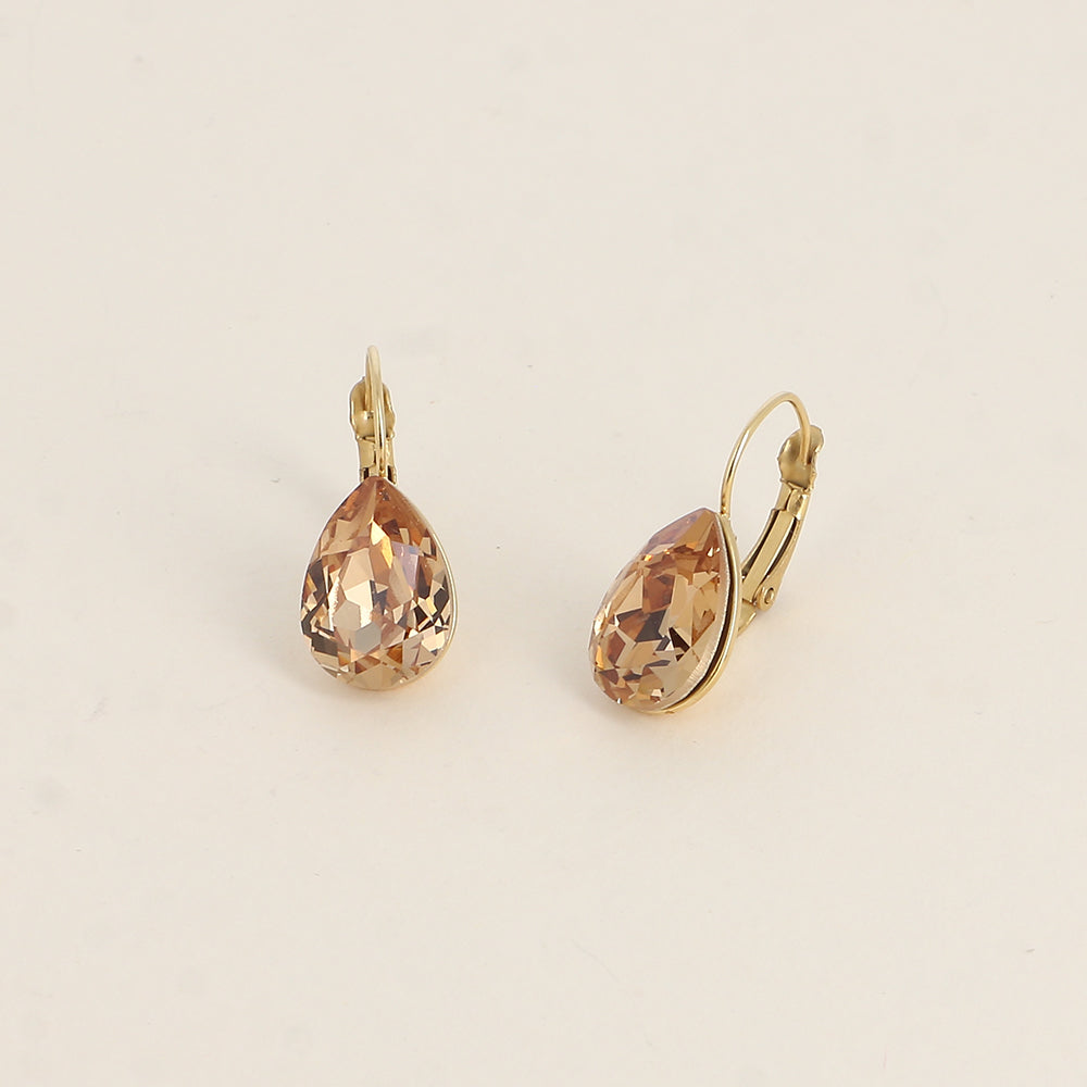 Boucles dormeuses ornées de cristaux de Swarovski® - Dimensions de la boucle : 10 x 23mm - Dimensions du cristal : 10 x 13mm - Light Colorado topaz