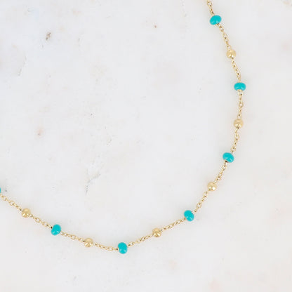 Collier doré embelli de petites boules en émail turquoise 40+5 cm