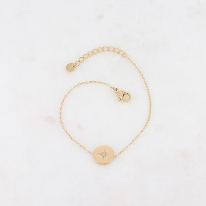 Bracelet avec pièce ronde et strass