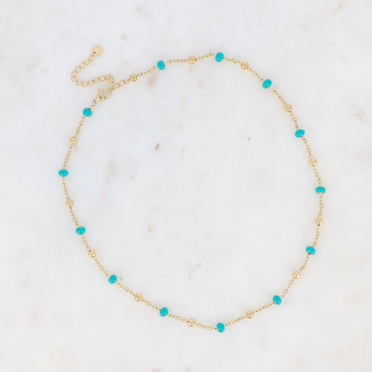 Collier doré embelli de petites boules en émail turquoise 40+5 cm