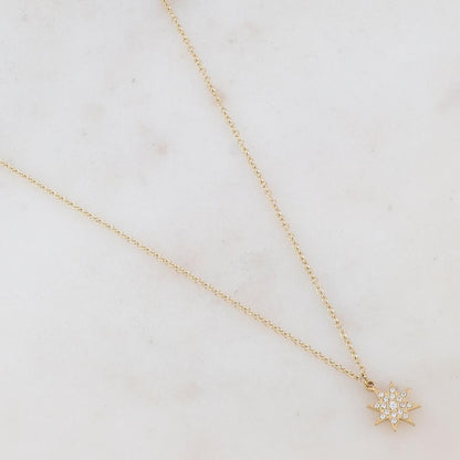 Collier doré avec un pendentif étoile embelli de strass blancs 41+5 cm