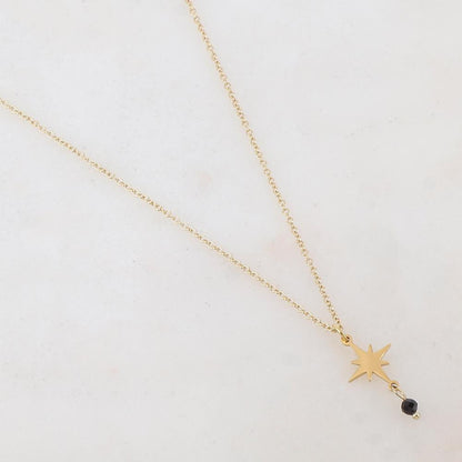 Collier doré composé d'une étoile et d'une pierre noire 39+5 cm