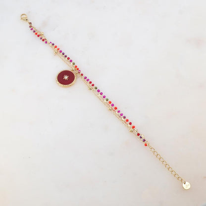 Bracelet trois rangs avec perles émaillées, petites boules, pièce ronde émaillée, étoile et strass