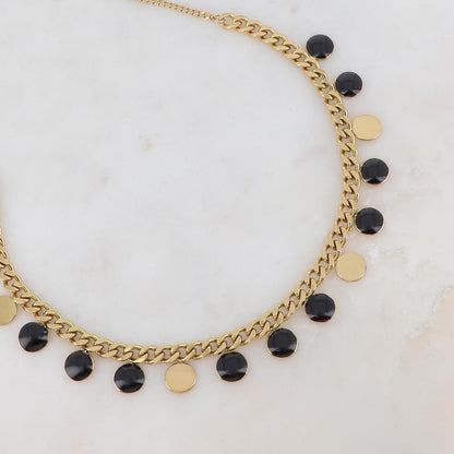 Collier en maille gourmette doré embelli de pampilles rondes émaillées noires 38+5 cm