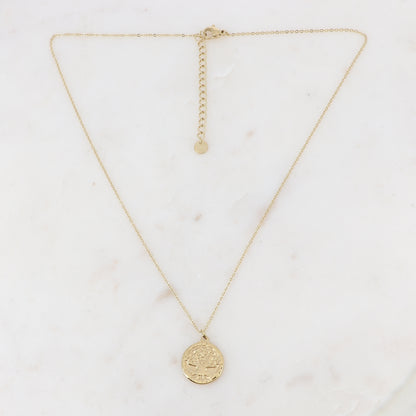 Collier doré composé d'un pendentif rond avec un motif arbre de vie 40+5 cm