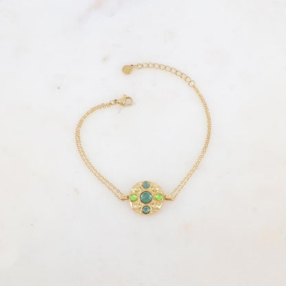 Bracelet avec pièce ronde et 5 pâtes de verre rondes