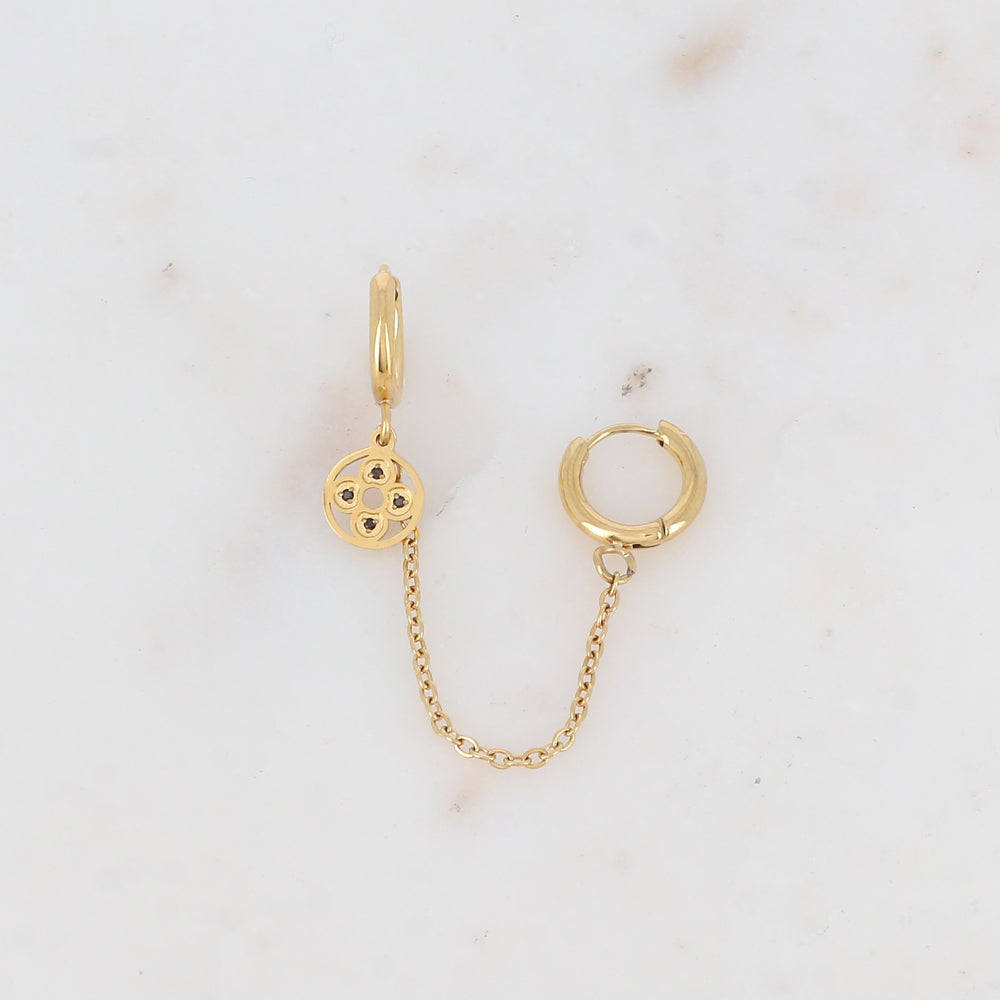 Mono créole avec chaîne, pampille ajourée et strass Longueur chaîne : 5 cm. Diamètre créoles: 1,2 cm